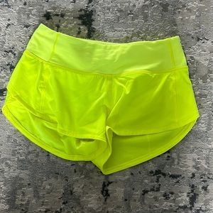 NEON YELLOW LULULEMON SPED UP SHORTS SIZE 0